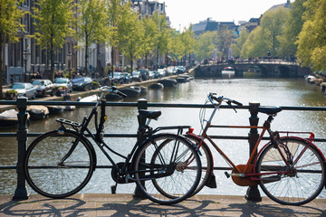 Fototapeta na wymiar Bikes on the bridge in Amsterdam, Netherlands.