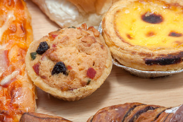 variety of bakery on wooden plate