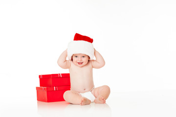 Cute Baby Santa with red gift boxes