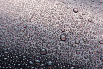 close up drops of water on aluminium can