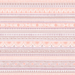 Seamless ethnic pattern. Tribal and aztec motifs. Striped vintage print. Pink, purple and white colors. Trend print for textiles.