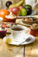 black tea with cakes