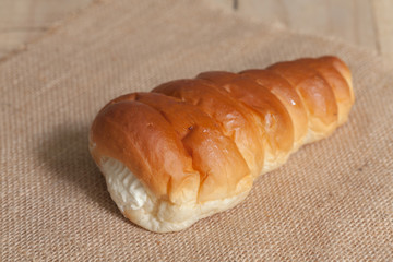 cannoli cone with cream on sack