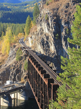 Rustic Train trussell over dam with curved track 