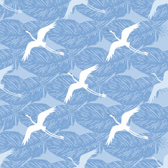 Fototapeta premium Crane birds with feathers on a blue background. Vector seamless pattern