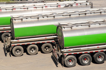 Automotive fuel tankers shipping fuel,  logistics truck, oil, power.
