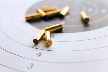 bullets on paper target for shooting practice