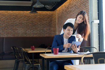 Asian business man and asian business woman.