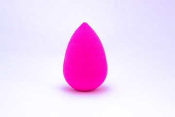 Pink Beauty Blender isolated on white background