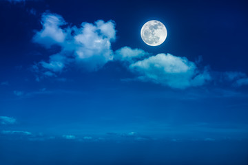 Landscape of night sky with beautiful full moon, serenity nature background. © kdshutterman