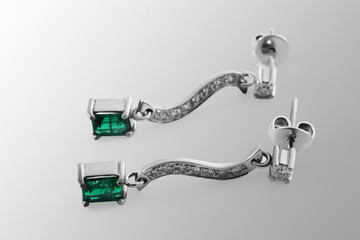 emerald earrings  in gold with diamonds and gemstone