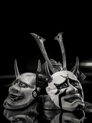 Kabuki Mask, Bushido Warrior Legend. Resin Made Skull with Bushido Iron Helmet and Kabuki Mask closeup on background.
