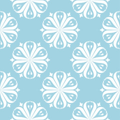 White floral seamless pattern on blue background