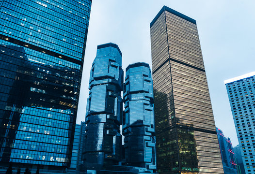 directly below of modern financial skyscrapers in central Hong Kong,blue toned,china.