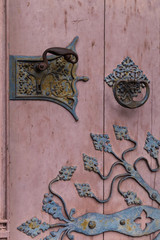 old door with  with  handle and  door knocker