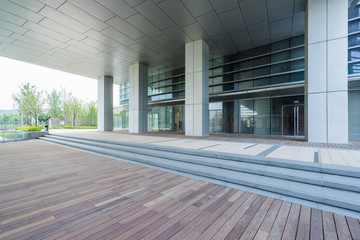 modern glass building exterior with empty pavement,copy space,shanghai,china.