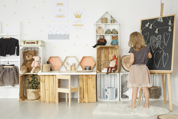 Girl in bright scandi room © Photographee.eu