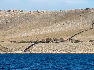Sailing on a yacht along an island village in Croatia, farming alone on an empty desert island,...