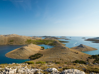 Fototapeta na wymiar Aerial panoramic view of islands in Croatia with many sailing yachts between, Kornati national park landscape in the Mediterranean sea