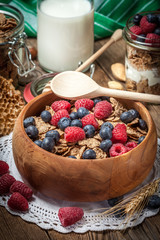 Tasty breakfast with milk and fruit.