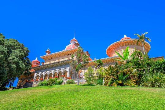 Sintra, Portugal. The Monserrate Palace surrounded by botanical park in beautiful sunny day. Palacio de Monserrate is the summer resort of the Portuguese court.