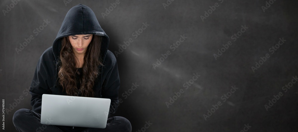 Poster composite image of young female hacker using laptop while