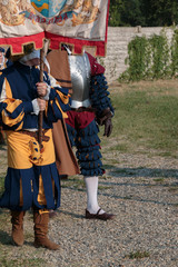 Knight and  Squire with City Standard during Parade in Historical Event Reconstruction