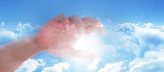 Composite image of hand of man pretending to hold an invisible