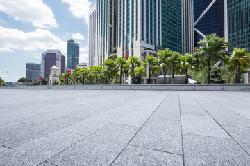 empty marble floor with modern buildings