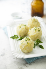 Potato knodel with fresh parsley