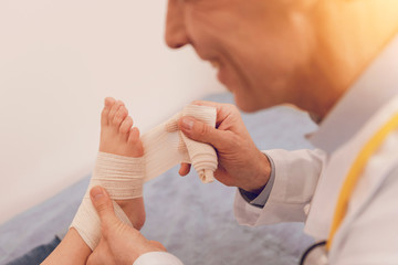 Portrait of smiling doctor that looking at his patient