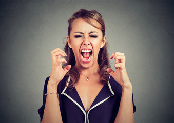 Angry frustrated woman screaming