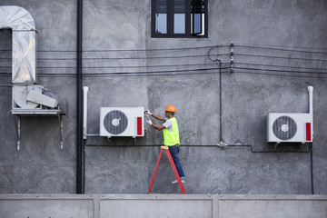 Air Conditioning Technician and A part of preparing to install new air conditioner.