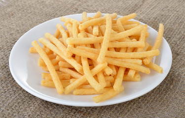 Sweet potato chips on white plate