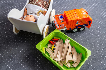 Colorful toys on the carpet in kindergarten