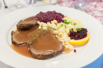 roast beef with gravy and cranberries