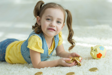Child with a piggy bank 