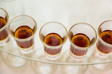 Catering services. Celebration. glasses red alcohol placed on the glass