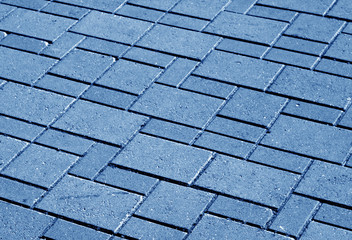blue color pavement pattern with blur effect.