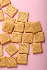 Crunchy snack biscuits on pink
