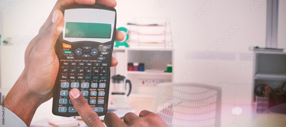 Poster composite image of hands of businessman using calculator