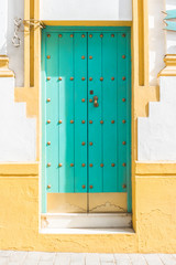 Detail of a wooden door in the city of Seville, Spain.