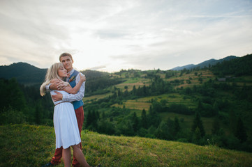 happy couple in cloudy day