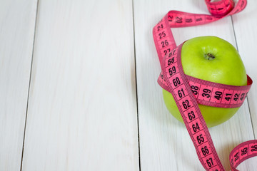 Green apples measured the meter, sport and diet