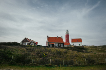 Fototapeta na wymiar Landscape with lighthouse building