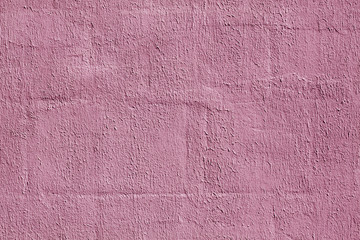 Pink color plaster wall pattern.