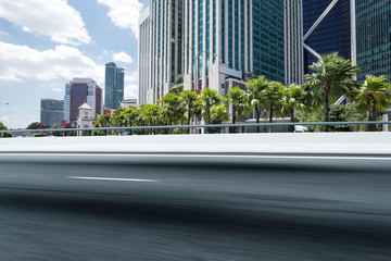 empty asphalt road with modern buildings