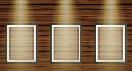 Three picture frames on wooden board