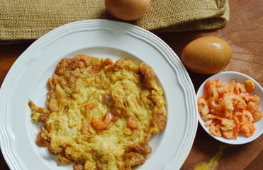 fried egg stuffed dry shrimp on dish
