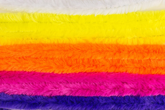 background of multicolored pipe cleaners